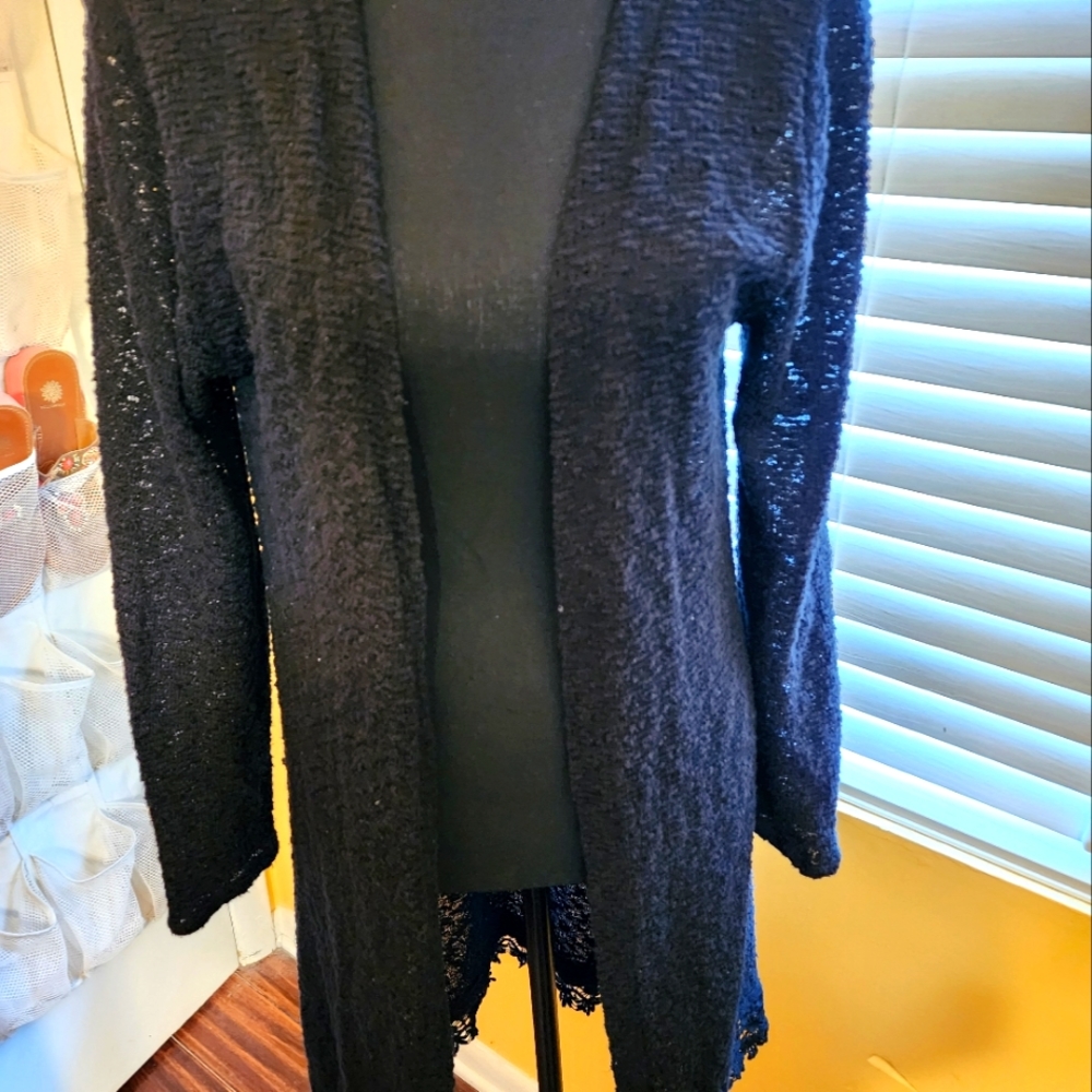 Black open front sweater by Heart- n-Crush.